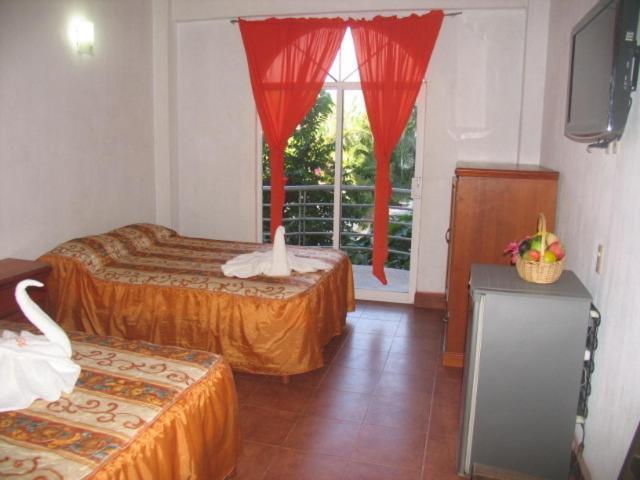Hotel Y Suites Bugambilias Rincón de Guayabitos Quarto foto